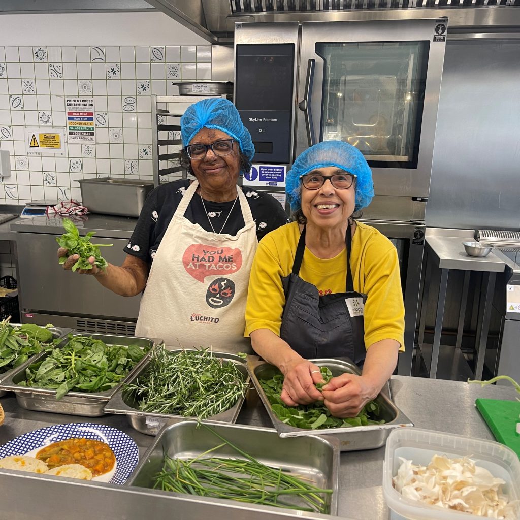 Two people in kitchen