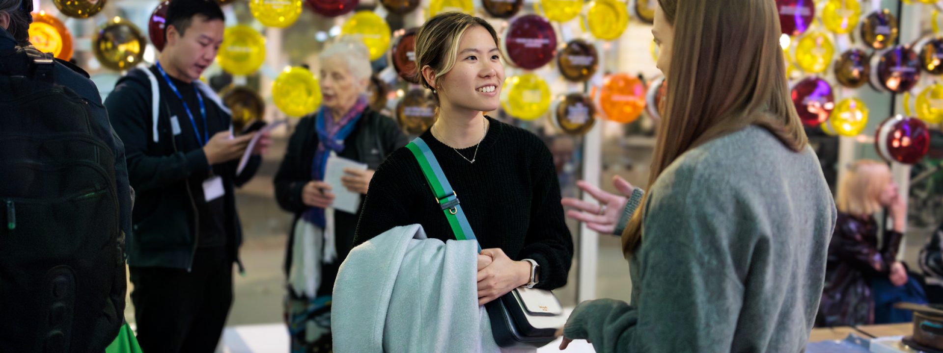 People talking at a celebration event